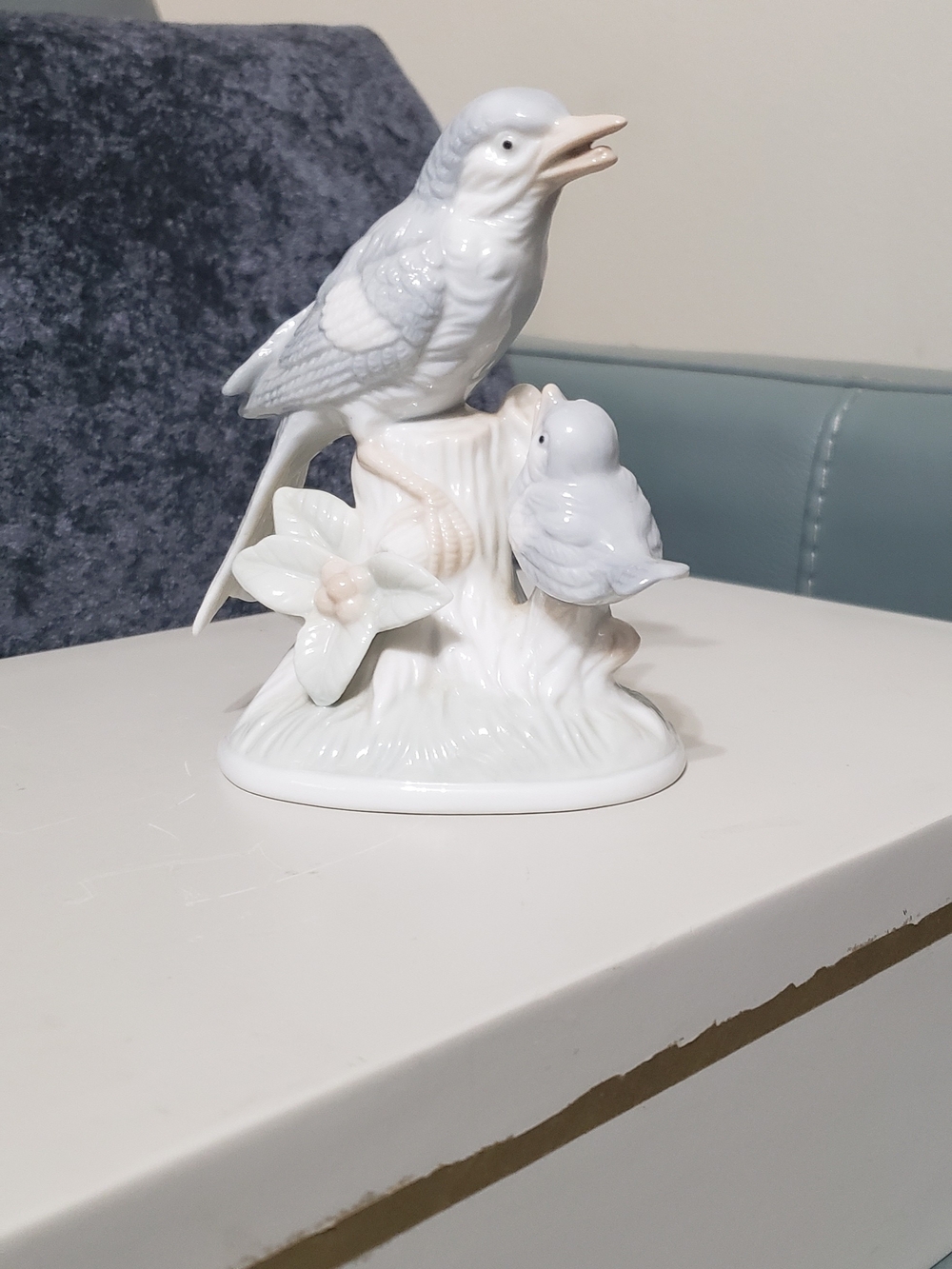 White Porcelain Bird Figurine with Floral Accent